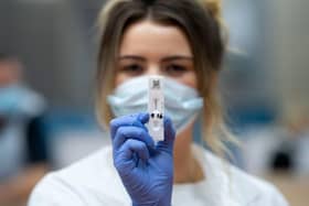 A coronavirus tester holding a lateral flow device