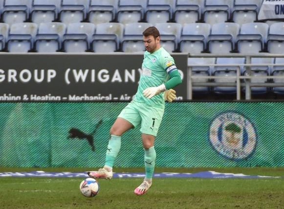 Jamie Jones: 6 - Barely forced into a save worthy of the name thanks to the brick wall in front of him