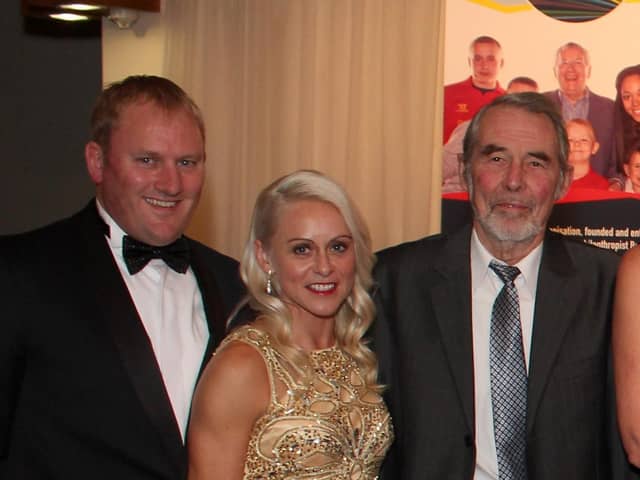 Cyril Leigh with Jenny Meadows and her husband, Trevor Painter, at the Wigan Harriers 50th anniversary dinner in 2013