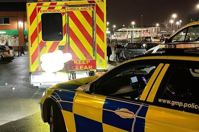 Officers were called to the scene at Asda in Harpurhey, Manchester, on Wednesday night