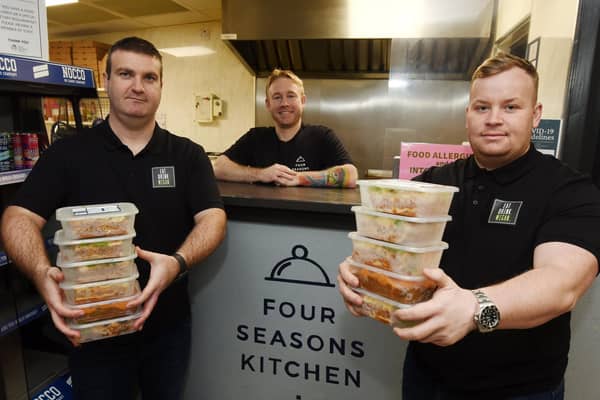 Darryl Latham and Ben Anglesea, from Eat Drink Wigan, with Ben Melling, centre, owner of Four Seasons Kitchen