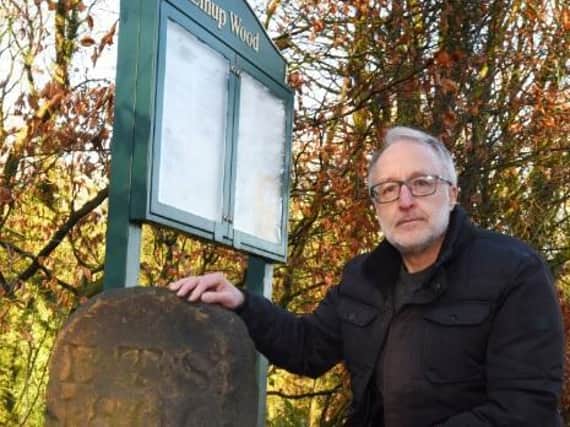 Jim Meehan with the marker stone at Elnup Wood