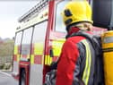 Wigan firefighters rescue man who fell into brook