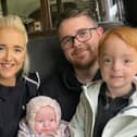Scott Lowe with his wife Jordan and their children