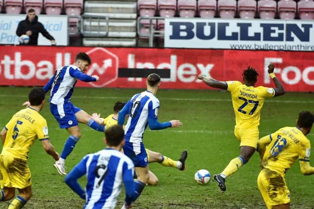 Jamie Proctor scores his first goal for Latics
