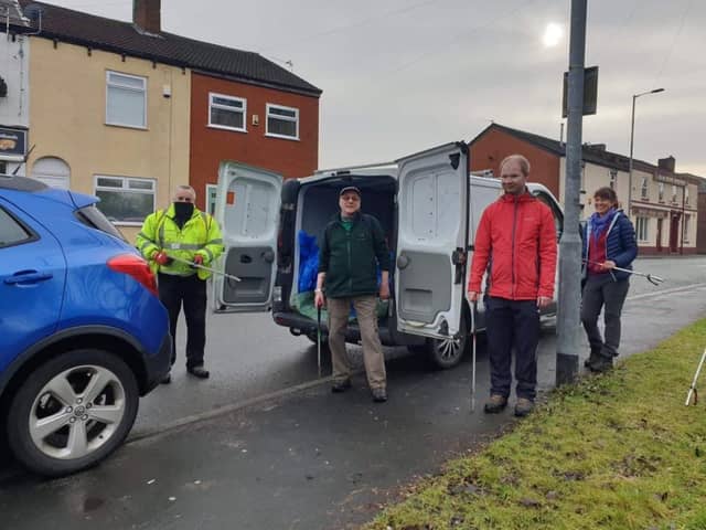 Coun Paul Blay with volunteers in Hindley