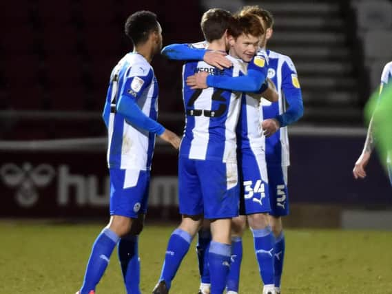 Luke Robinson celebrates a clean sheet and three points on his full debut