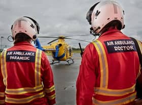 Air ambulance crew prepare for take-off