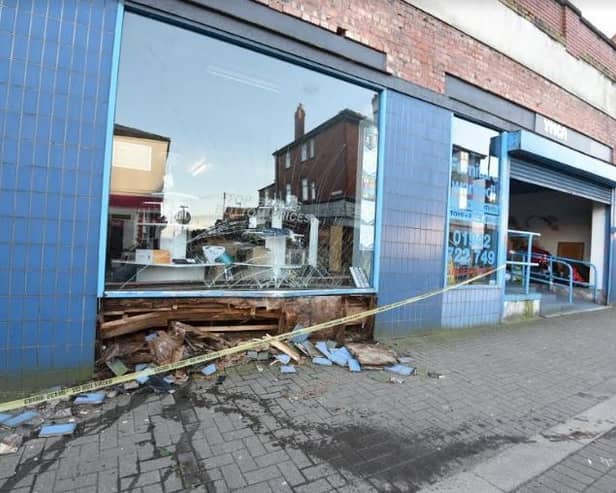 Damage to the YMCA charity shop in Ashton
