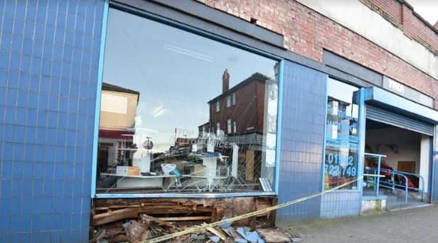Damage to the YMCA charity shop in Ashton