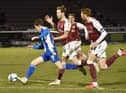 Callum Lang shoots for goal against Northampton