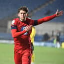 Callum Lang celebrates opening the scoring