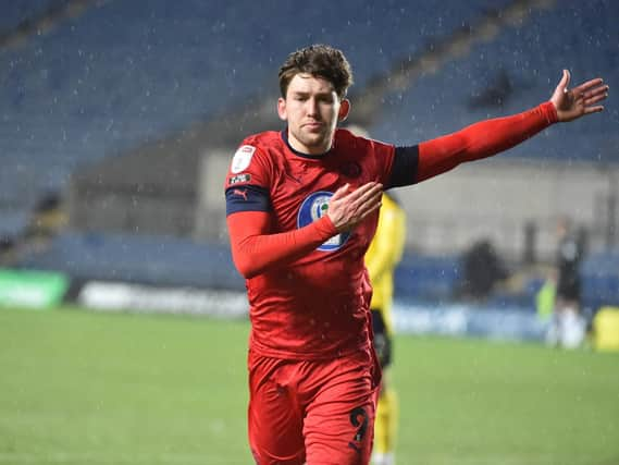 Callum Lang celebrates opening the scoring