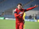 Callum Lang celebrates opening the scoring