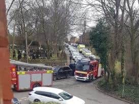 Fire engines struggle to get past parked cars in Hindley Mill Lane