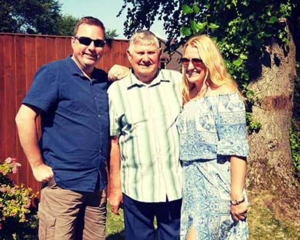 David Brown, centre, with children Darran Brown and Deborah Ellison