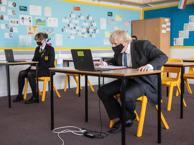 Prime Minister Boris Johnson visits Sedgehill School in south east London and takes part in an online class on February 23 (Photo by Jack Hill - WPA Pool/Getty Images)