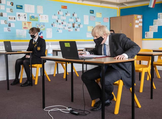 Prime Minister Boris Johnson visits Sedgehill School in south east London and takes part in an online class on February 23 (Photo by Jack Hill - WPA Pool/Getty Images)