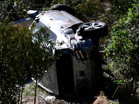 The vehicle driven by golfer Tiger Woods lies on its side in Rancho Palos Verdes, California after a rollover accident.