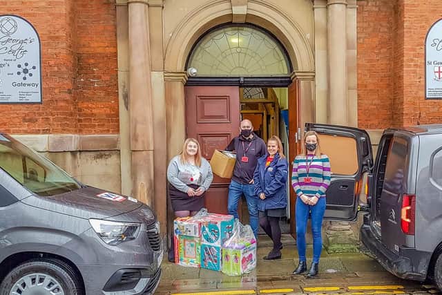 Bethan Hurst, Westwood Group vehicle sales and rental executive, and Laura Edwards, Westwood Group finance director, delivering donations to The Brick