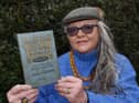 History enthusiast Caroline Heaven with the 1914 walking book