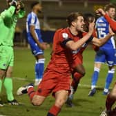 Scott Wootton celebrates scoring the winning goal at Bristol Rovers