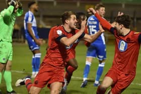 Scott Wootton celebrates scoring the winning goal at Bristol Rovers