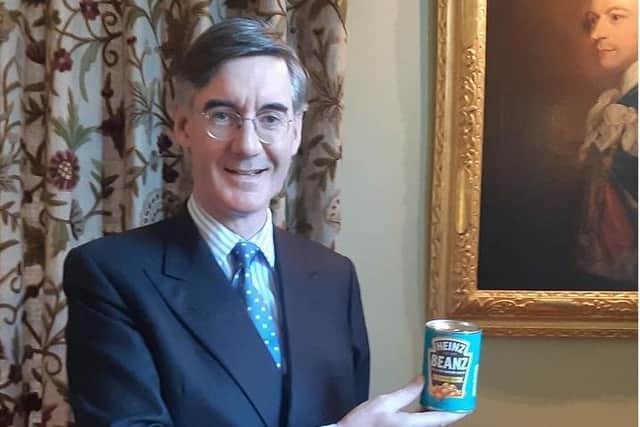 Jacob Rees-Mogg proudly poses with his gift of Heinz Beanz. Image: Instagram