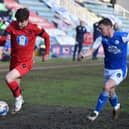 Callum Lang battles hard against Peterborough