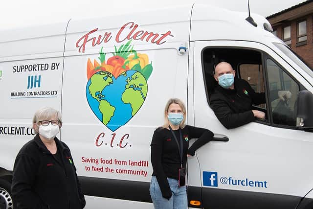 Fur Clemt proudly pose with their new van. Image: Wigan Council