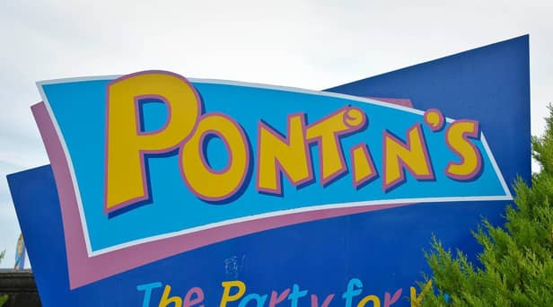 The owner of Pontins has entered into a legal agreement with the human rights watchdog