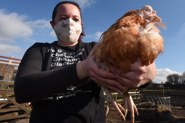 Hazel McGuinness with one of the hens