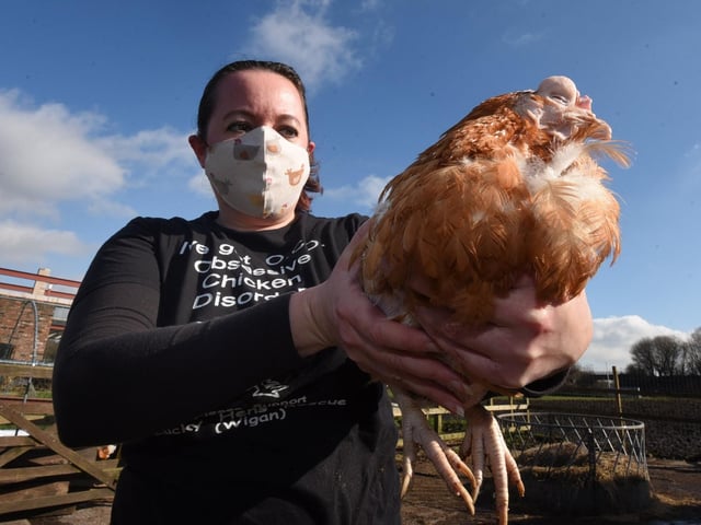 Hazel McGuinness with one of the hens