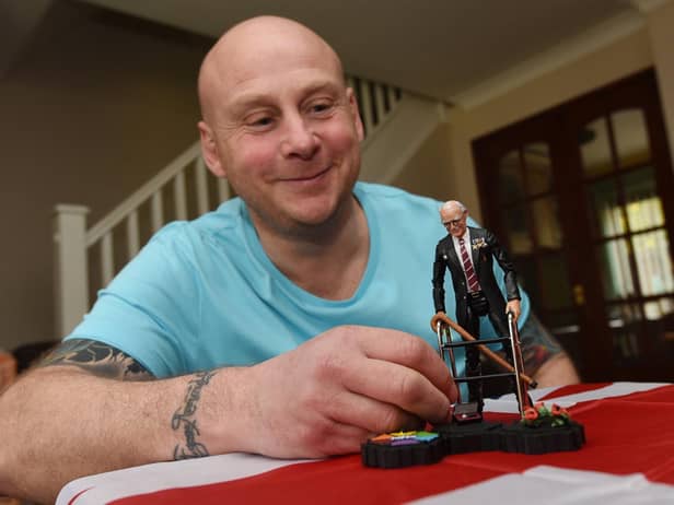 Neil Westergren is raising money for the NHS by auctioning the action figure of Captain Tom