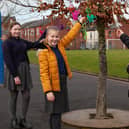Megan, Eva and Ella hang their dreamcatchers at St George's Primary School in Tyldesley