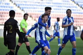 George Johnston celebrates his opening goal