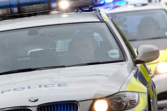 Police arrest two men after a short pursuit of a stolen car