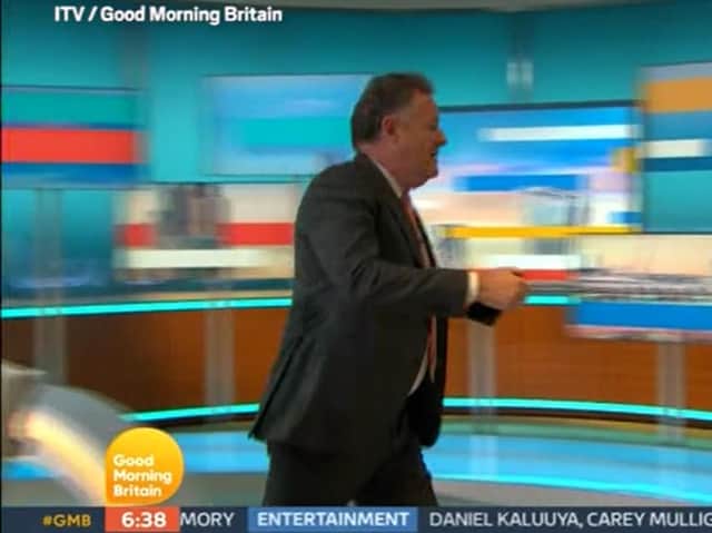 Video grab taken from ITV of presenter Piers Morgan walking off set during a Good Morning Britain discussion about the Duchess of Sussex with his colleague, Alex Beresford