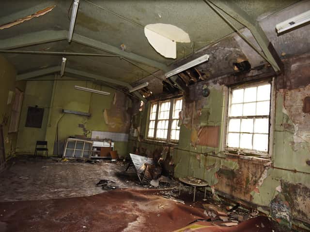 One of the many empty rooms in the former sorting offices at the rear which haven't been used for half a century. The first job is to waterproof the premises