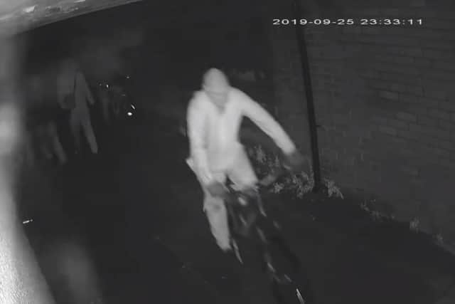 Police want to identify two men in connection with the murder. (Credit: Lancashire Police)