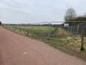 The fenced off field