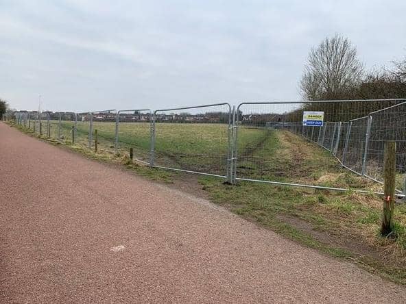 The fenced off field