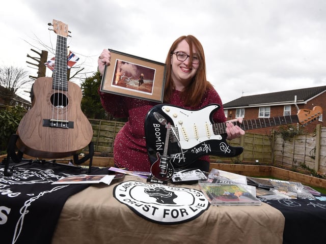 Sarah Hardman with some of the items in the music-themed raffle