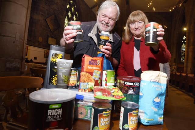 Rob Foster and Jean Groves promoting the foodbank