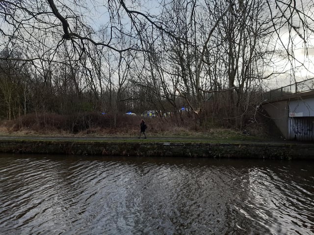 Emergency services in the car park off Scot Lane at Beech Hill, near to the Leeds and Liverpool Canal