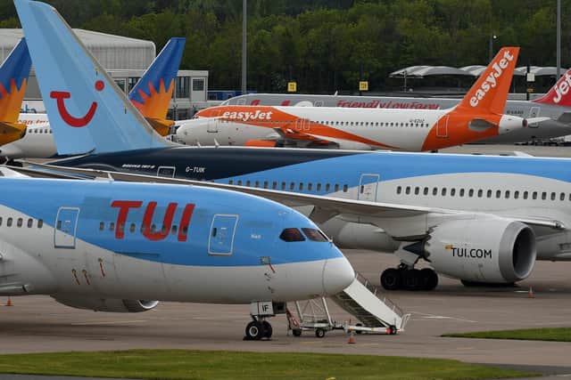 Planes at Manchester Airport. Photo by Getty Images