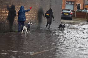The road and pathway flooded on Buckley Street, Wigan, after heavy rainfall after Storm Christoph hit the borough.