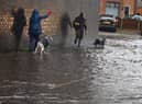 The road and pathway flooded on Buckley Street, Wigan, after heavy rainfall after Storm Christoph hit the borough.