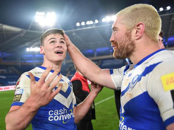 Jack Welsby (left) celebrates his match-winning try against hometown club Wigan Warriors in last November's Grand Final