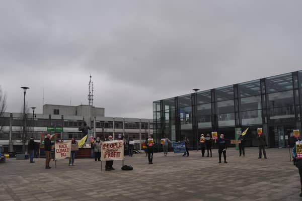 Protestors in Believe Square on United Nations' Anti-Racism Day